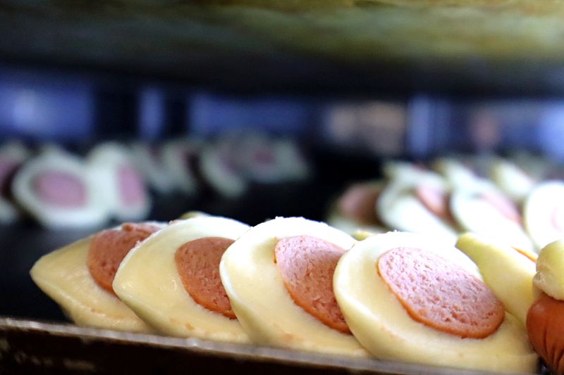 Fresh savory buns in the Zimo bakery case